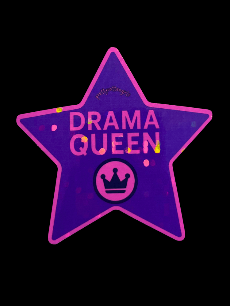 Purple star-shaped sign with 'Drama Queen' text and a crown symbol on a black background