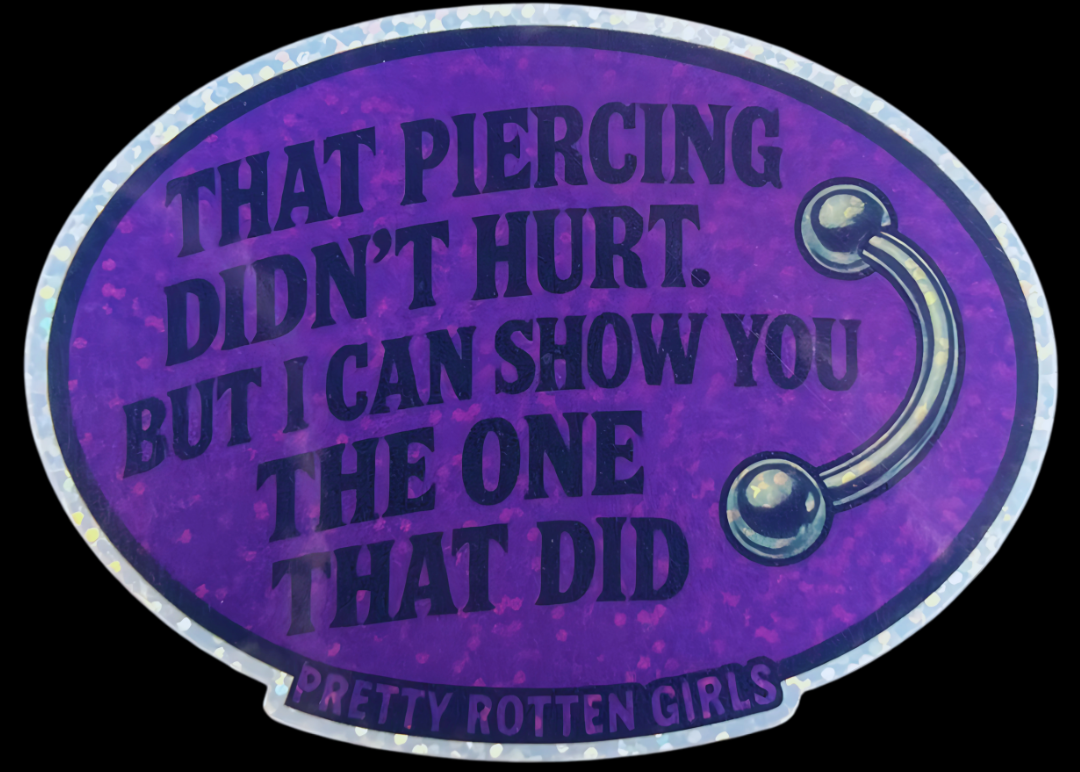Purple oval sticker with text and a small hook illustration on a black background
