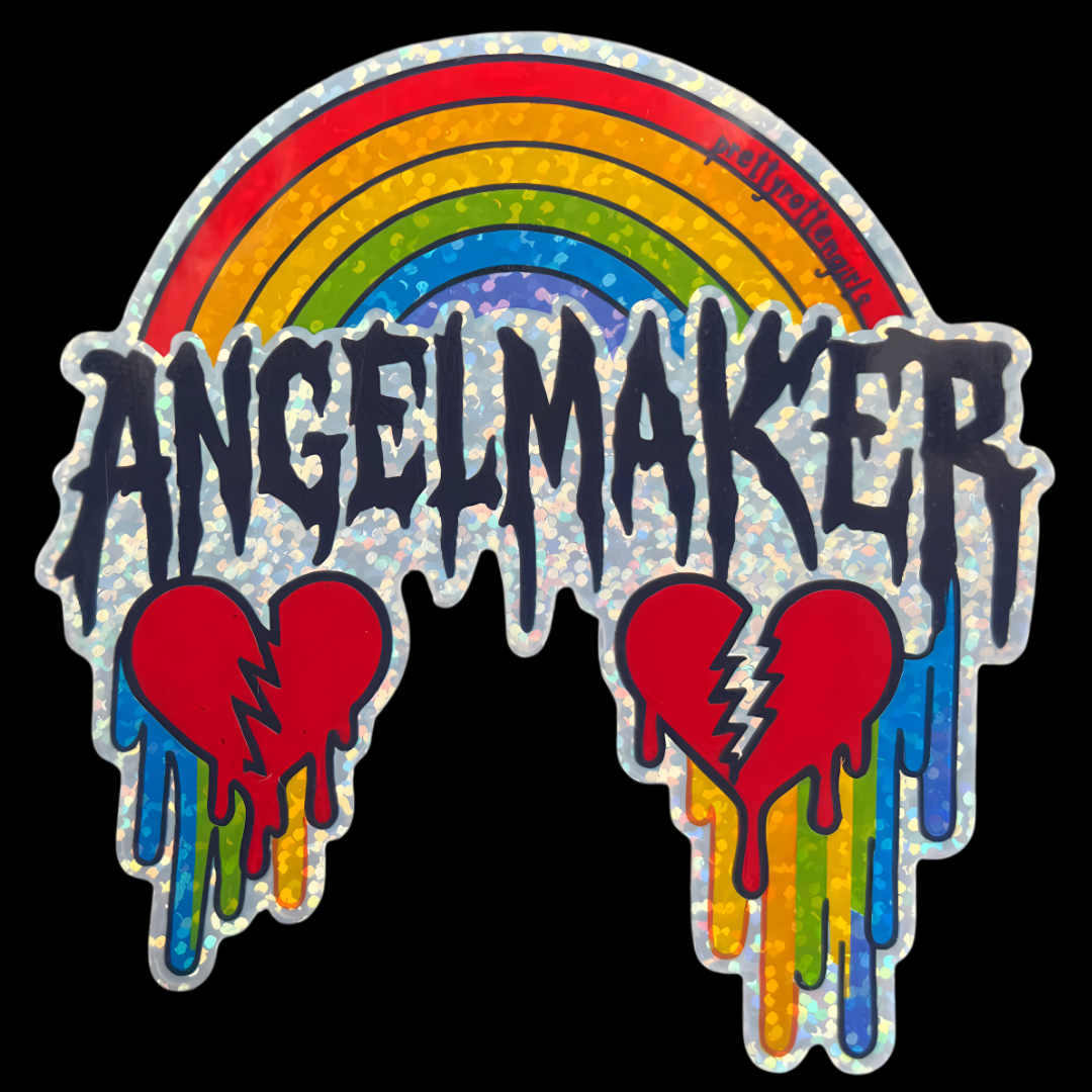 Sticker with rainbow, hearts, and 'ANGELMAKER' text on a black background