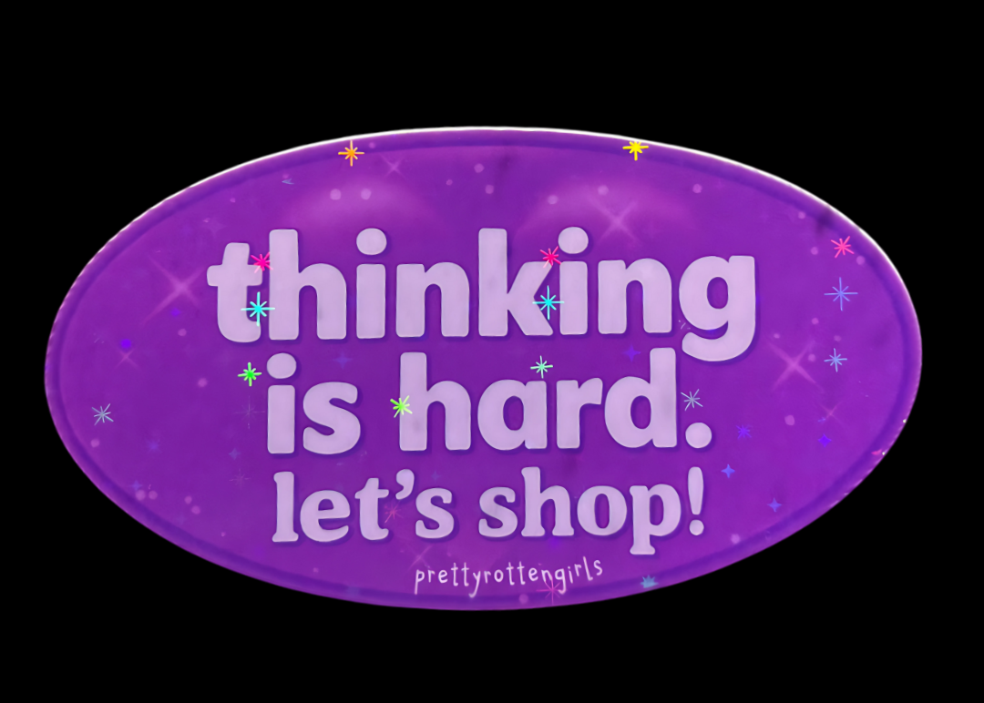 Purple oval sticker with white text 'thinking is hard. let's shop!' on a black background