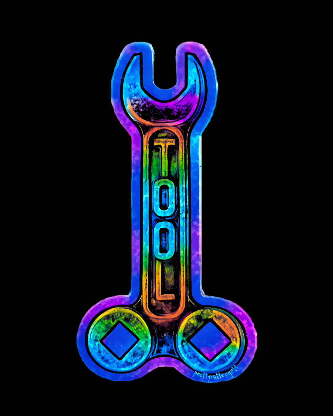 Colorful wrench-shaped tool with 'TOOL' text on a black background